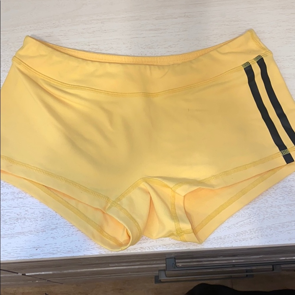 Yellow spandex booty shorts Med